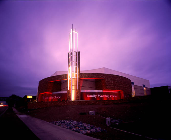 Faith Bible Chapel exterior lit up at night